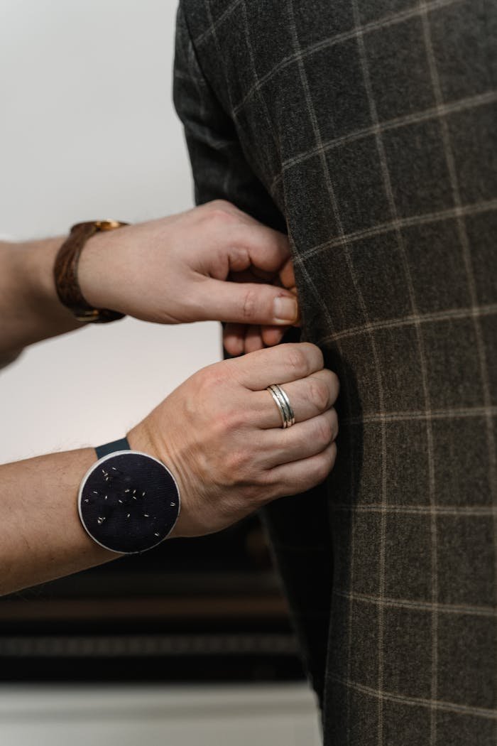 Person Wearing Silver Ring and Silver Ring